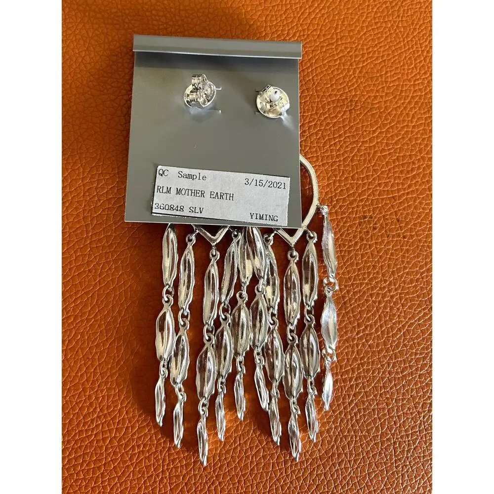 Robert Lee Morris Silver Tone Mother Earth Earrings