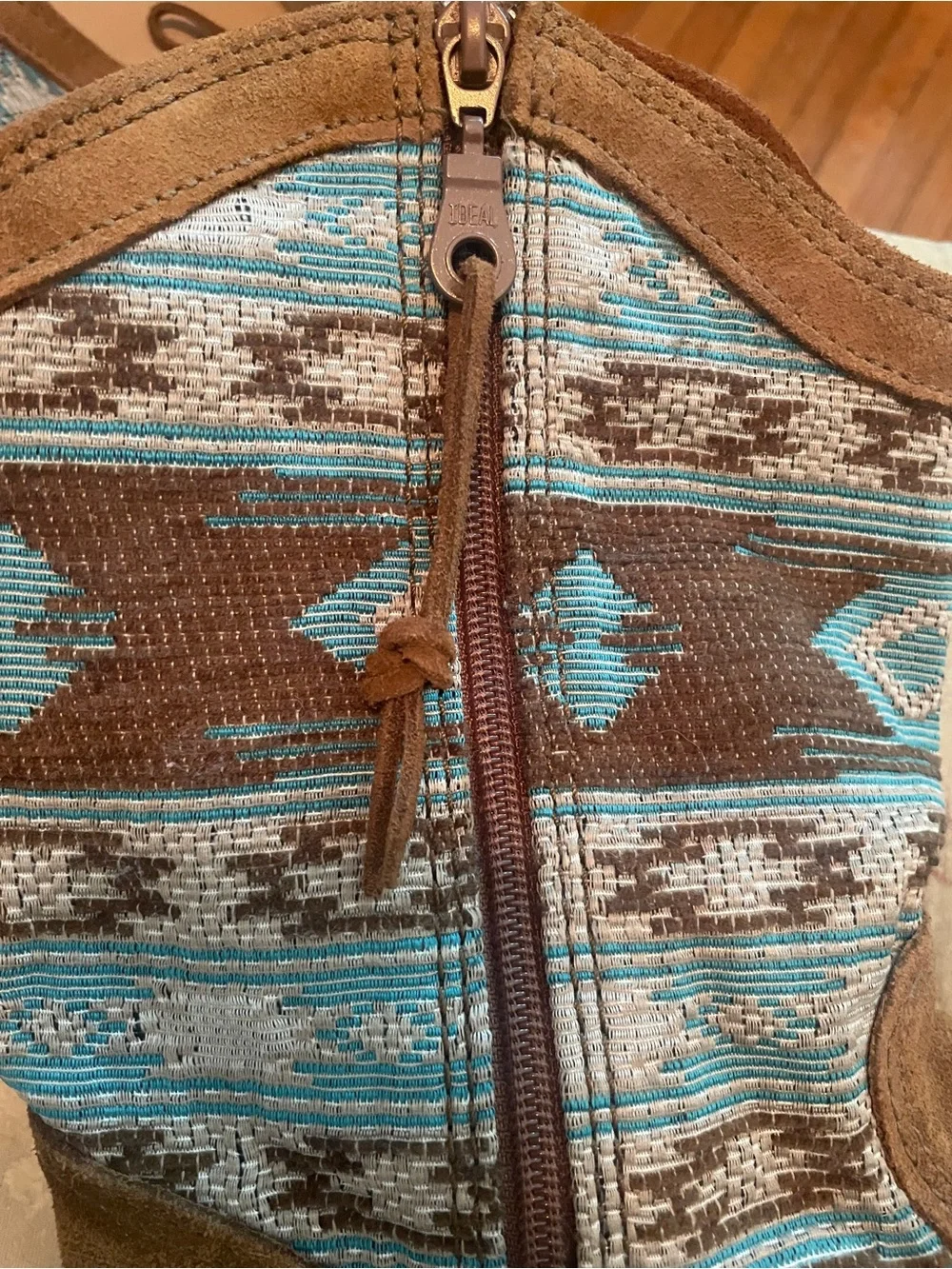 Brand new Minnetonka Baja Boots!