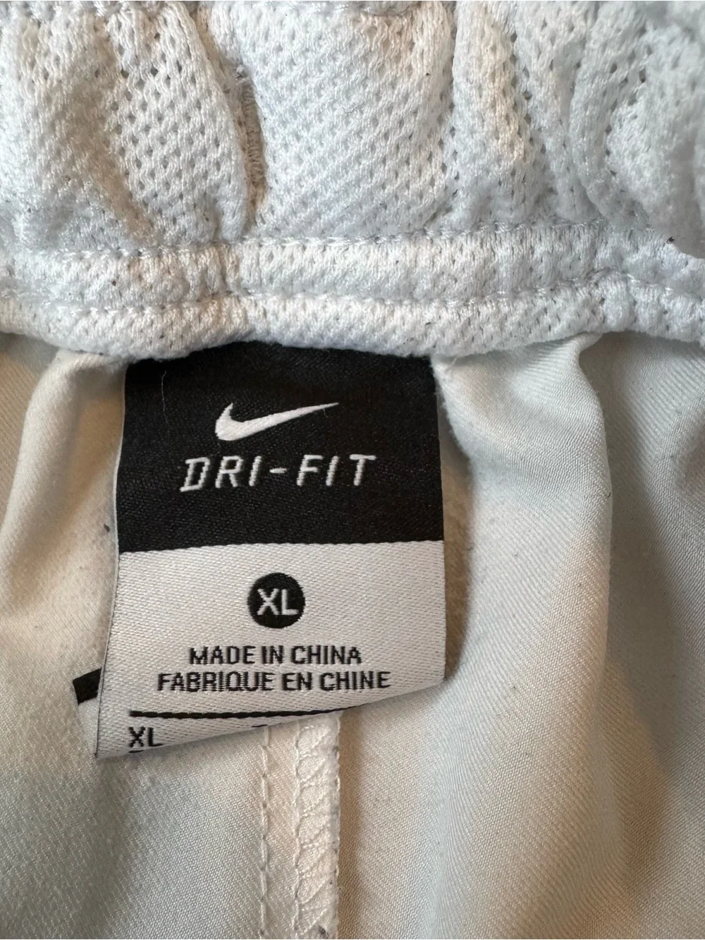 Nike Men’s White Athletic Shorts with Black Graphic